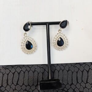 Black studded earrings with rhymes sensual